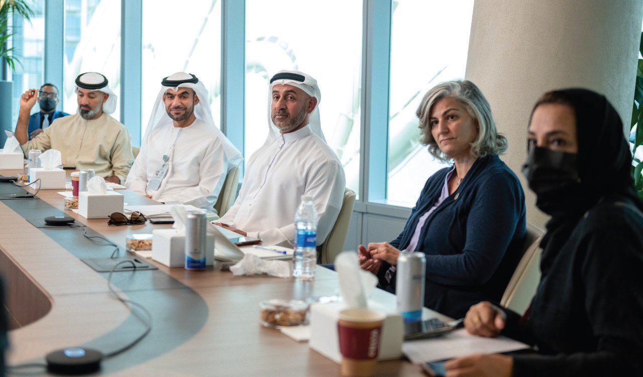 AGF professionals sitting at a conference table - NOMU a National Youth Development Initiative to empower 25,000 Emirati youth by 2025