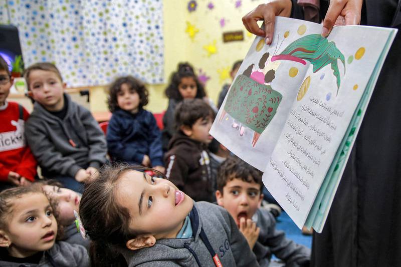 Stories being read to children in a classroom in Amman in March. AFP