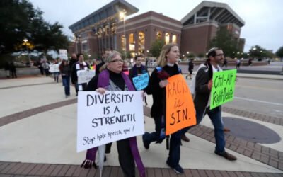 Protesters march against racism and white nationalism at Texas A&M University, on Tuesday, December 6, 2016, in College Station, Texas [File: David J Phillip/AP Photo]