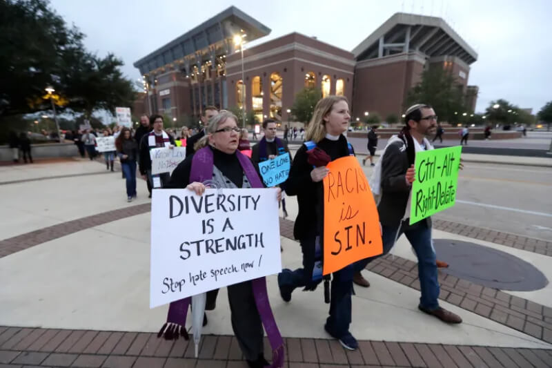 Protesters march against racism and white nationalism at Texas A&M University, on Tuesday, December 6, 2016, in College Station, Texas [File: David J Phillip/AP Photo]