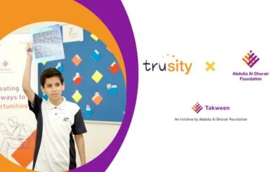 Banner of a student holding a diagram sheet, with Trusity, Abdulla Al Ghurair Foundation, and Takween logos on the right.